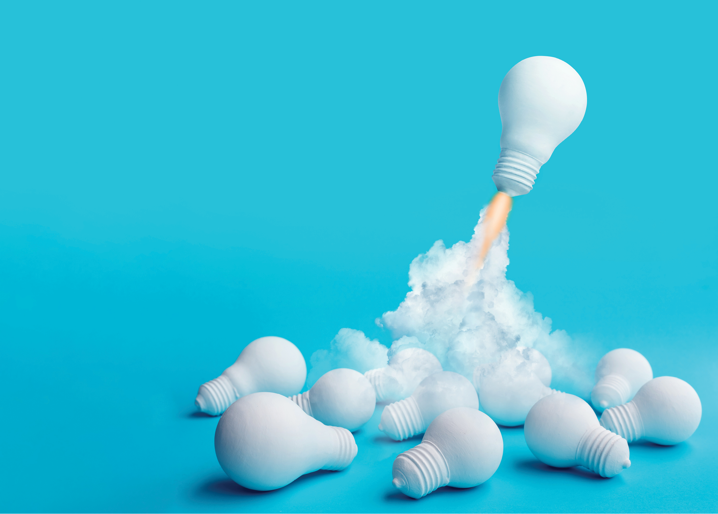Ideas inspiration concepts with rocket lightbulb flying on group of another lightbulb Business start up or goal to success  creativity of human