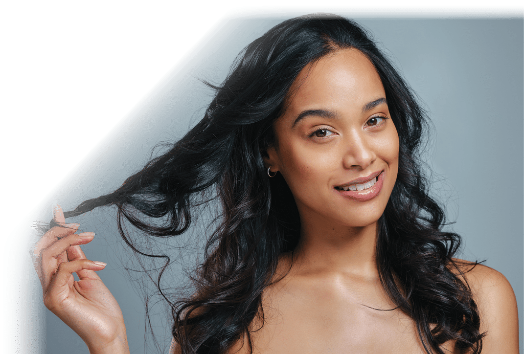 I hope you have a good hair day today. Studio portrait of an attractive young woman posing against a grey background.
