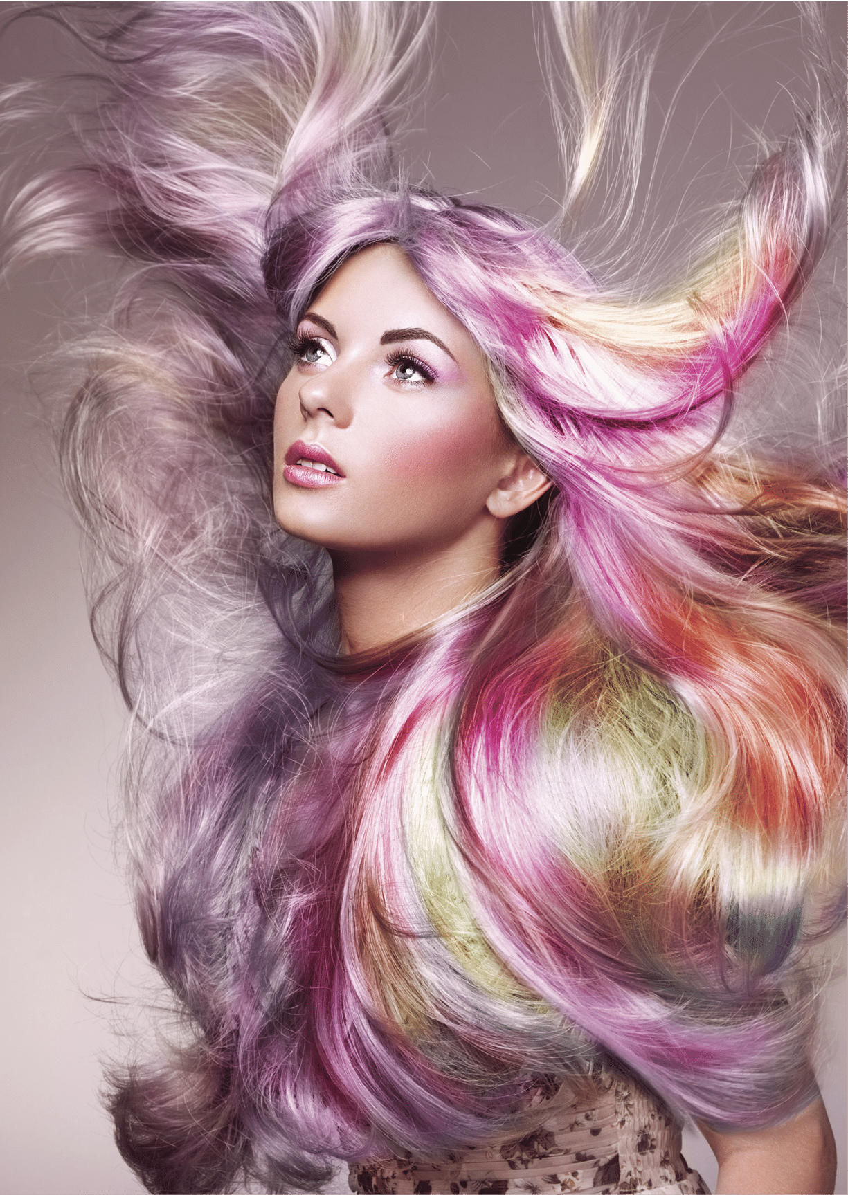 Beauty Fashion Model Girl with Colorful Dyed Hair. Girl with perfect Makeup and Hairstyle. Model with perfect Healthy Dyed Hair. Rainbow Hairstyles