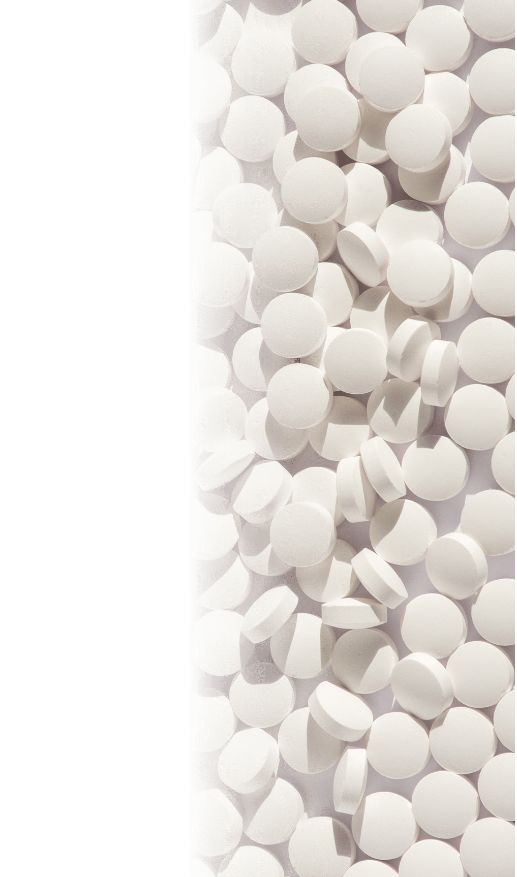 Various pills on a laboratory work table