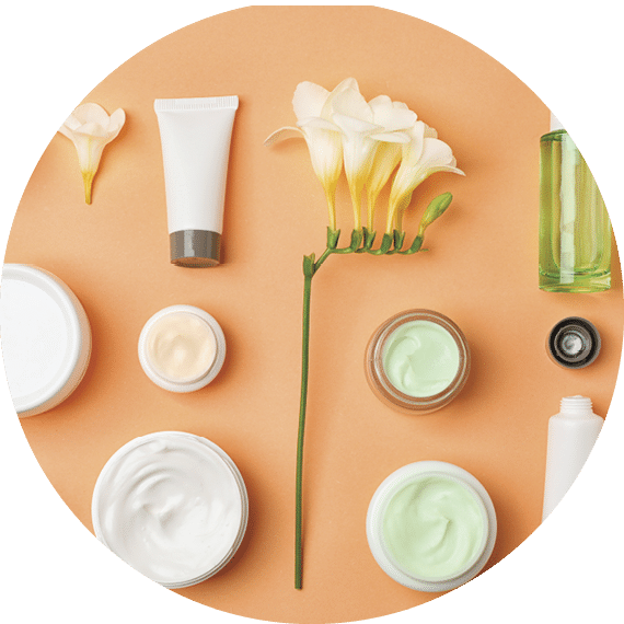 Flat lay composition with cosmetic products on color background