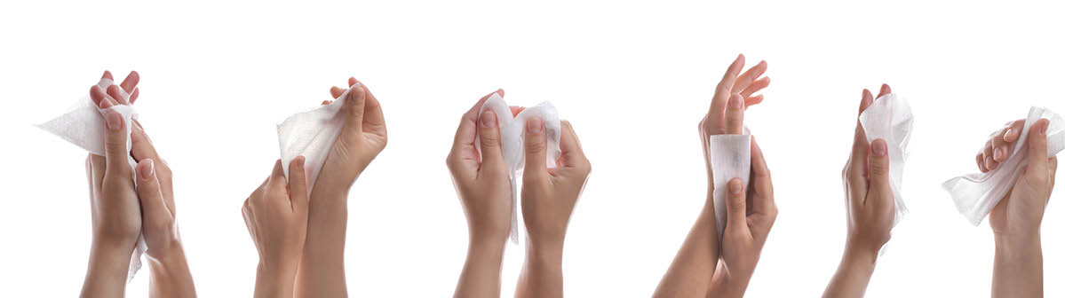 Closeup view of people cleaning hands with wet wipes on white background, collage. Banner design