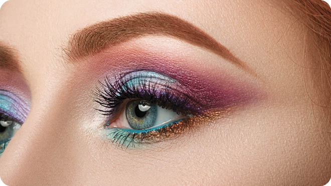 Close-up view of female blue eye with beautiful make-up. Perfect Make-up closeup.