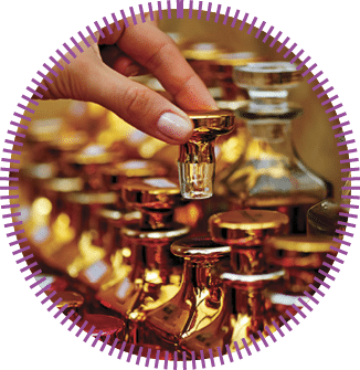 Glass perfume bottles based oils. A Bazaar, market. Macro. Gold and pink gamma