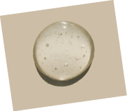 cosmetic smears of creamy texture on a pastel background