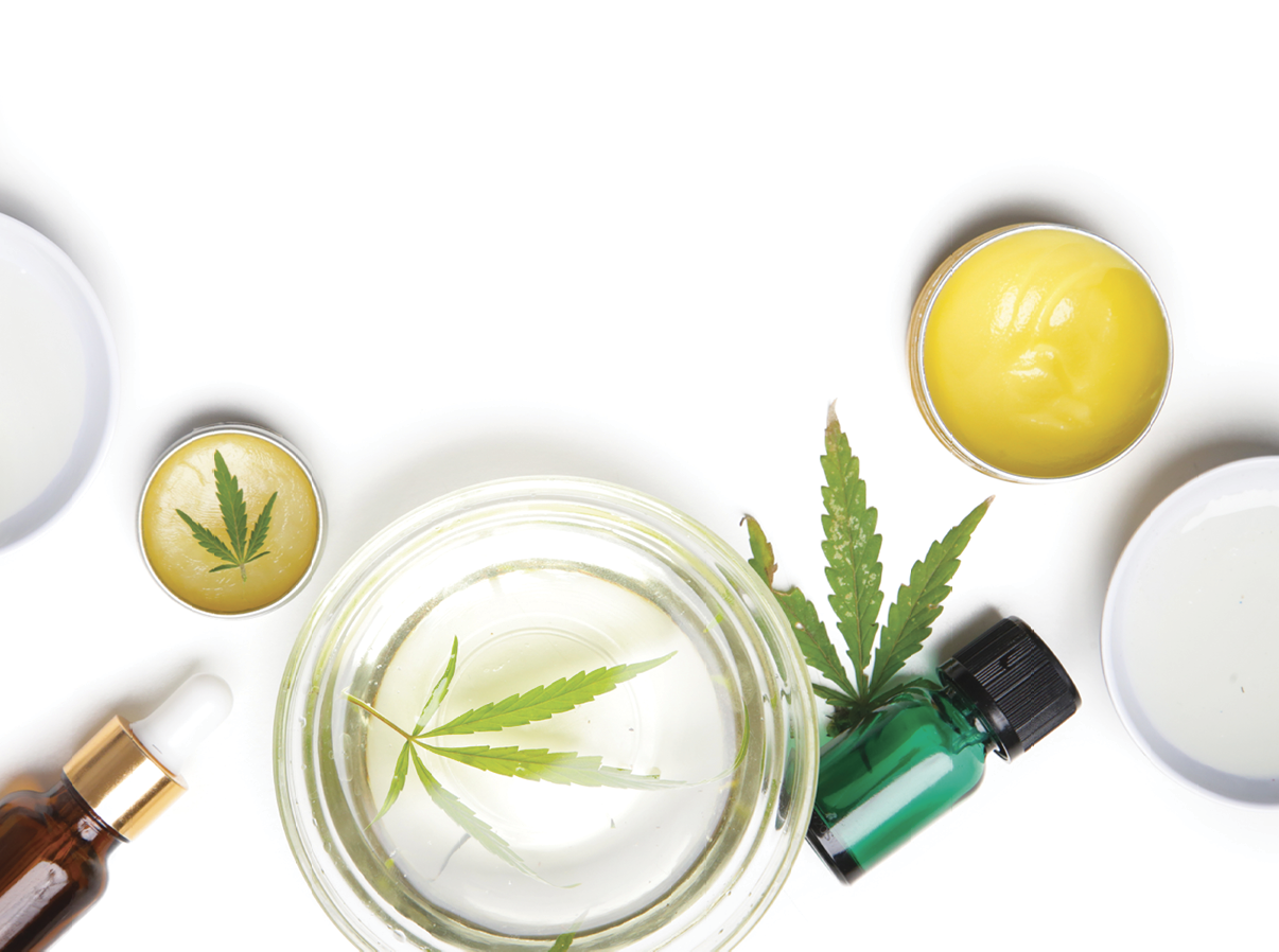 Medical marijuana. Cosmetics and tinctures with CBD oil on white background with copy space. 