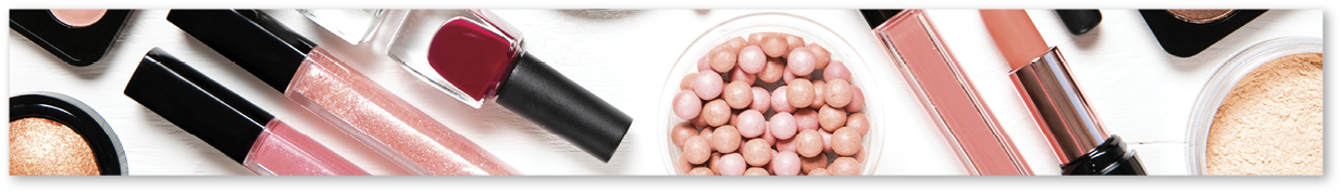 Decorative cosmetics and makeup brushes on a white background, top view
